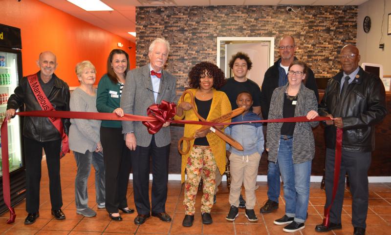 Attendees shown are (l-r) 2019 Marvelous Man Bill Vendetti; chamber Ambassador Barbara Steele; chamber Treasurer Angel Hodges; chamber President Darel LaPrade; Sisters Caribbean owner Elourdes Pierre, her son Marcus Mirand and her nephew Nathan Pierre; chamber member Todd Hilliker; Downtown Milford Inc. Executive Director Trish Gerken; and City of Milford Mayor Archie Campbell. SUBMITTED PHOTO